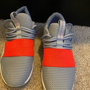 Blue and orange under armor shoes